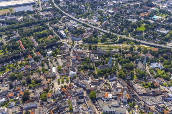 Aerial view, city centre with Alter Markt and catholic parish church Zur Heiligen Familie and evang. Pauluskirche, Sesekepark between Maibrücke and Hochstraße with river Seseke in Kamen, Ruhr area, North Rhine-Westphalia, Germany, place of worship, federal road B233, City, DE, Europe, religious community, place of worship, holy place, city centre, Kamen, church, parish, denomination, aerial view, aerial photography, aerial photography, market place, town view, park, religion, religious site, townscape, urban area, city centre, overview, bird's-eye view, overview