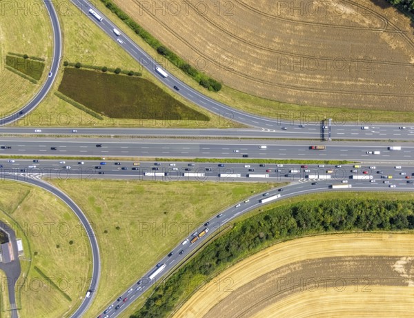 Aerial view, Kamen junction with motorway A1 and motorway A2, Kamen, Ruhr area, North Rhine-Westphalia, Germany, motorway, motorway junction Kamen, DE, Europe, shapes and colours, aerial view, aerial photography, aerial photography, traffic jam, road traffic, overview, traffic volume, bird's eye view, birds-eyes view, overview