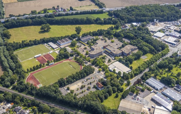 Aerial view, school centre with Fridtjof Nansen Realschule and Gesamtschule Kamen and sports facility in Kamen, Ruhr area, North Rhine-Westphalia, Germany, education, educational institution, DE, Europe, football pitch, football stadium, comprehensive school, Kamen, educational institute, aerial view, aerial photography, aerial photography, secondary school, school, sports facilities, sports field, sports facility, stadium, overview, bird's eye view, bird's eye view, overview