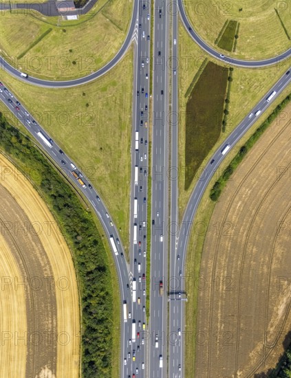 Aerial view, Kamen junction with motorway A1 and motorway A2, Kamen, Ruhr area, North Rhine-Westphalia, Germany, motorway, motorway junction Kamen, DE, Europe, shapes and colours, aerial view, aerial photography, aerial photography, traffic jam, road traffic, overview, traffic volume, bird's eye view, birds-eyes view, overview