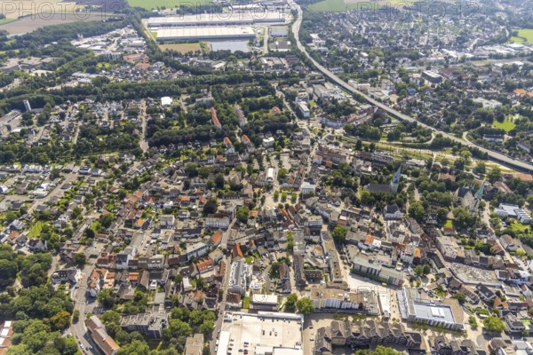 Aerial view, city centre with Alter Markt and catholic parish church Zur Heiligen Familie and protestant church Pauluskirche in Kamen, Ruhr area, North Rhine-Westphalia, Germany, place of worship, city, DE, Europe, religious community, place of worship, holy place, city centre, Kamen, church, parish, denomination, aerial view, aerial photography, aerial photography, market place, town view, religion, religious place, townscape, city area, city centre, overview, bird's eye view, birds-eyes view, overview