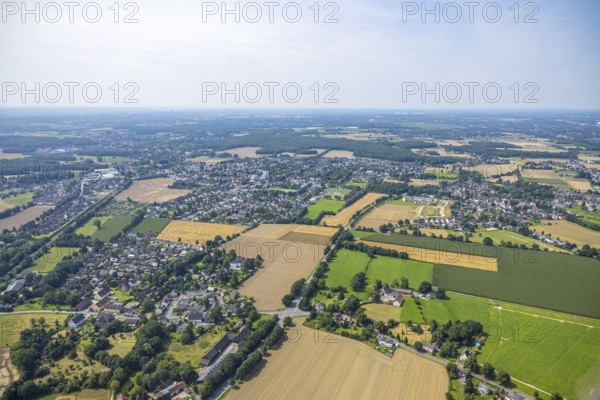 Aerial view, Peter and Paul retirement centre and construction site of a climate protection settlement in the new development area south of Methler village on Kiebitzweg in the Methler district, Kamen, Ruhr area, North Rhine-Westphalia, Germany, retirement home, old people's home, construction work, construction area, construction site, building plots, construction, construction project, construction site, care and nursing, DE, Europe, aerial view, aerial photography, aerial photography, new construction, care facility, retirement home, retirement home, retirement home, retirement centre, overview, bird's eye view, housing estate, birds-eyes view, overview