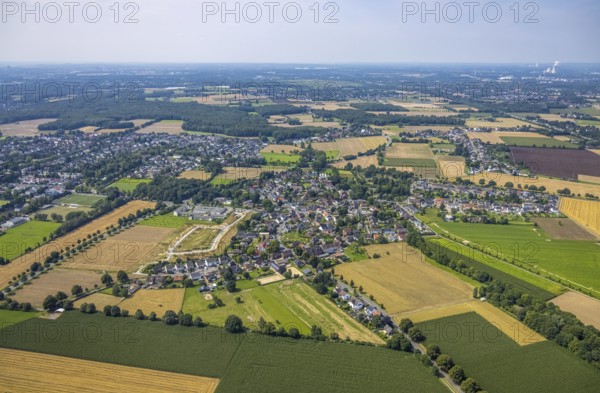 Aerial view, Peter and Paul retirement centre and construction site of a climate protection settlement in the new development area south of Methler village on Kiebitzweg in the Methler district, Kamen, Ruhr area, North Rhine-Westphalia, Germany, retirement home, old people's home, construction work, construction area, construction site, building plots, construction, construction project, construction site, care and nursing, DE, Europe, aerial view, aerial photography, aerial photography, new construction, care facility, retirement home, retirement home, retirement home, retirement centre, overview, bird's eye view, housing estate, birds-eyes view, overview