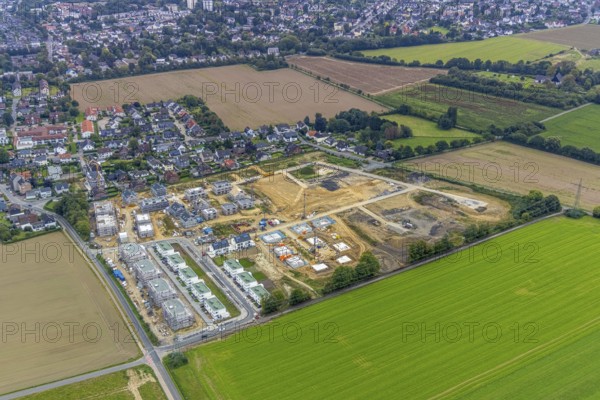 Aerial view, construction site and new building, Emscherquelle residential park on the site of the former Hellweg barracks in the Hohenleuchte district of Holzwickede, Ruhr area, North Rhine-Westphalia, Germany, construction work, construction, construction area, building site, building plots, construction project, construction site, DE, Europe, property tax, Holzwickede, real estate, aerial view, aerial photography, aerial photography, new building, overview, bird's-eye view, housing estate, housing and living, residential area, residential buildings, residential quality, residential neighbourhood, housing estate, birds-eyes view, overview