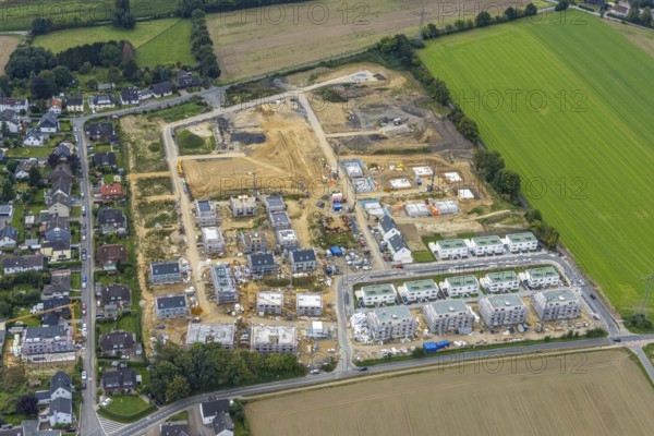 Aerial view, construction site and new building, Emscherquelle residential park on the site of the former Hellweg barracks in the Hohenleuchte district of Holzwickede, Ruhr area, North Rhine-Westphalia, Germany, construction work, construction, construction area, building site, building plots, construction project, construction site, DE, Europe, property tax, Holzwickede, real estate, aerial view, aerial photography, aerial photography, new building, overview, bird's-eye view, housing estate, housing and living, residential area, residential buildings, residential quality, residential neighbourhood, housing estate, birds-eyes view, overview