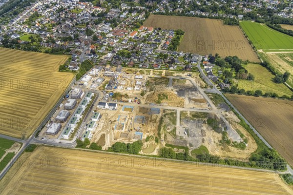 Aerial view, construction site and new building, Emscherquelle residential park, former Emscher barracks, Hohenleuchte, Holzwickede, Ruhr area, North Rhine-Westphalia, Germany, construction work, construction area, building site, building plots, construction project, construction site, DE, Emscher barracks, renewal, development, Europe, capacity requirements, aerial view, aerial photography, aerial photography, new building, Schäferkampstraße, Sölder Straße, overview, bird's-eye view, bird's-eye view, overview