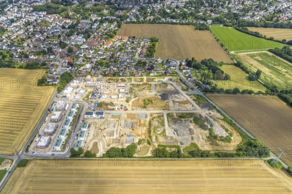 Aerial view, construction site and new building, Emscherquelle residential park, former Emscher barracks, Hohenleuchte, Holzwickede, Ruhr area, North Rhine-Westphalia, Germany, construction work, construction area, building site, building plots, construction project, construction site, DE, Emscher barracks, renewal, development, Europe, capacity requirements, aerial view, aerial photography, aerial photography, new building, Schäferkampstraße, Sölder Straße, overview, bird's-eye view, bird's-eye view, overview