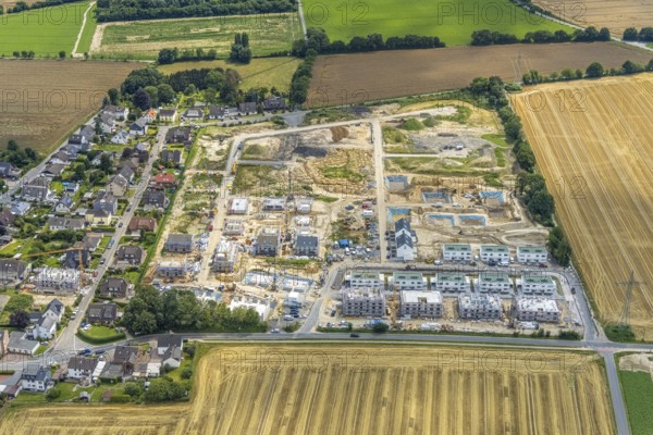 Aerial view, construction site and new building, Emscherquelle residential park, former Emscher barracks, Hohenleuchte, Holzwickede, Ruhr area, North Rhine-Westphalia, Germany, construction work, construction area, building site, building plots, construction project, construction site, DE, Emscher barracks, renewal, development, Europe, capacity requirements, aerial view, aerial photography, aerial photography, new building, Schäferkampstraße, Sölder Straße, overview, bird's-eye view, bird's-eye view, overview