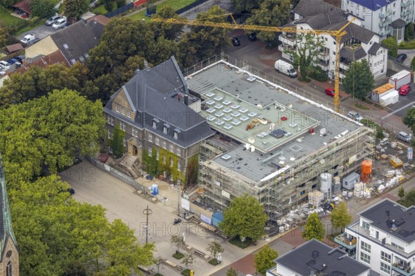 Aerial view, town hall Holzwickede with construction site and extension of the city administration in the district Freiberg in Holzwickede, Ruhr area, North Rhine-Westphalia, Germany, Am Markt, extension, construction work, construction area, building site, building plots, construction project, construction site, DE, extension, Europe, Holzwickede, aerial view, aerial photography, aerial photography, new building, overview, bird's eye view, bird's eye view, overview