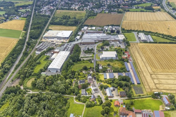 Aerial view, construction site and new construction logistics centre Schäferkampstraße and industrial estate in Hohenleuchte, Holzwickede, Ruhr area, North Rhine-Westphalia, Germany, construction work, construction, construction area, building site, building plots, construction measure, construction project, construction site, DE, Europe, commercial enterprises, commercial area, industrial estate, commercial location, commercial use, industrial area, industrial site, logistics, logistics service, logistics service provider, logistics provider, logistics centre, aerial view, aerial photography, aerial photography, new construction, photovoltaic, photovoltaic system, solar, solar system, solar roof, solar energy, overview, bird's-eye view, birds-eyes view, overview