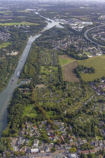 Aerial view, allotment garden association Horsthausen and allotment garden association Herne-Baukau with new meadow orchard Holper Heide at the Rhine-Herne canal in the district Horsthausen in Herne, Ruhr area, North Rhine-Westphalia, Germany, DE, Europe, community garden, Herne, KGV, allotment garden, allotment garden site, allotment garden association, allotment gardener association, landscape park orchard Holper Heide, aerial view, aerial photography, fruit tree park, allotment garden, overview, bird's-eye view, overview