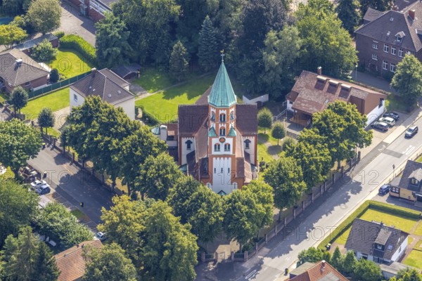Aerial view, catholic church Herz-Jesu in the district Heeren-Werve, Kamen, Ruhr area, North Rhine-Westphalia, Germany, place of worship, DE, Europe, religious community, place of worship, holy place, church, parish, denomination, aerial view, aerial photography, aerial photography, religion, religious site, overview, bird's-eye view, overview