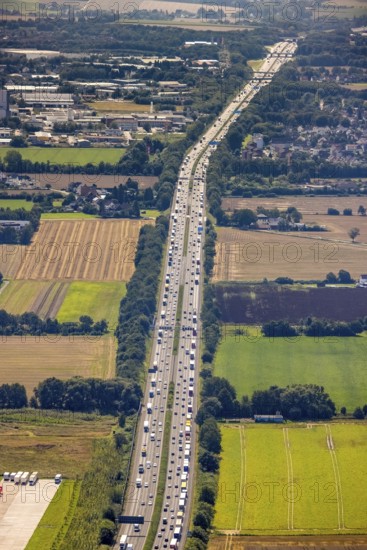 Aerial photo, traffic volume on the A1 motorway in Südkamen, truck traffic jam, Kamen, Ruhr area, North Rhine-Westphalia, Germany, motorway, DE, Europe, freight traffic, aerial photo, aerial photography, aerial photography, passenger traffic, road traffic, overview, traffic, traffic volume, bird's eye view, bird's eye view, overview