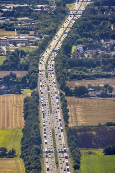 Aerial photo, traffic volume on the A1 motorway in Südkamen, truck traffic jam, Kamen, Ruhr area, North Rhine-Westphalia, Germany, motorway, DE, Europe, freight traffic, aerial photo, aerial photography, aerial photography, passenger traffic, road traffic, overview, traffic, traffic volume, bird's eye view, bird's eye view, overview