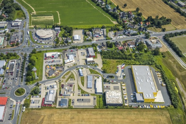 Aerial view, commercial area Unna / Kamen with Deutsche Post DHL and TCB Automobile, Südkamen, Kamen, Ruhr area, North Rhine-Westphalia, Germany, DE, Europe, commercial enterprises, commercial area, commercial park, commercial location, commercial use, freight traffic, industrial area, industrial building, industrial location, logistics, logistics service, logistics service provider, logistics provider, logistics centre, aerial view, aerial photography, aerial photography, overview, bird's eye view, bird's eye view, overview