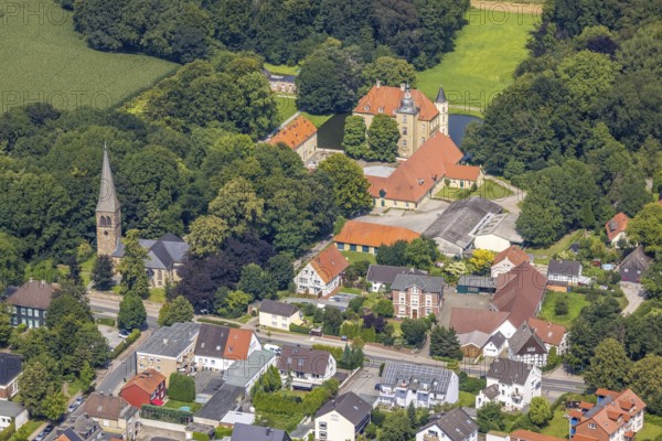 Aerial view, Heeren Castle and Heeren Protestant Church in the Heeren-Werve district, Kamen, Ruhr area, North Rhine-Westphalia, Germany, place of worship, DE, Europe, religious community, place of worship, moat, Heeren House, sacred site, church, parish, denomination, aerial photograph, aerial photography, aerial photography, religion, religious site, castle, overview, events, venue, event location, bird's-eye view, moated castle, birds-eyes view, overview