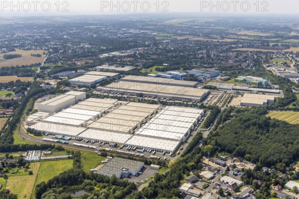 Aerial view, commercial area Unna-Nord with Fiege Unna GmbH and DHL Logistics, Alte Heide in Unna, Ruhr area, North Rhine-Westphalia, Germany, DE, Europe, commercial enterprises, commercial area, commercial park, commercial location, commercial use, industrial area, industrial building, industrial location, aerial photograph, aerial photography, aerial photography, overview, Unna, bird's-eye view, birds-eyes view, overview