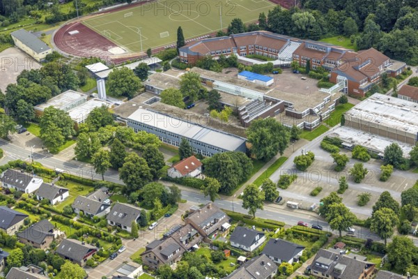 Aerial view, sports field school centre, Clara-Schumann-Gymnasium with solar roof, Josef Reding Schule, Freiberg, Holzwickede, Ruhr area, North Rhine-Westphalia, Germany, education, educational institution, DE, Europe, football pitch, football stadium, grammar school, teaching institute, athletics stadium, aerial view, aerial photography, aerial photography, school, sport, sports facilities, sports field, sports facility, stadium, overview, bird's-eye view, bird's-eye view, overview