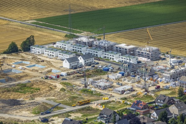Aerial view, construction site and new building, Emscherquelle residential park, former Emscher barracks, Hohenleuchte, Holzwickede, Ruhr area, North Rhine-Westphalia, Germany, construction work, construction area, building site, building plots, construction project, construction site, DE, Emscher barracks, renewal, development, Europe, capacity requirements, aerial view, aerial photography, aerial photography, new building, Schäferkampstraße, Sölder Straße, overview, bird's-eye view, bird's-eye view, overview