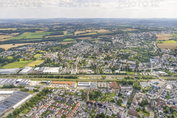 Aerial view, Holzwickede railway station, local supply centre, new Aldi supermarket, Freiberg, Holzwickede, Ruhr area, North Rhine-Westphalia, Germany, new Aldi supermarket, railway tracks, railway station, DE, Deutsche Bahn AG, shopping markets, shopping square, shopping centre, Europe, main station, main railway station, aerial view, aerial photography, aerial photography, photovoltaics, photovoltaic system, solar, solar system, solar roof, solar energy, solar energy, supermarket, overview, bird's eye view, birds-eyes view, overview