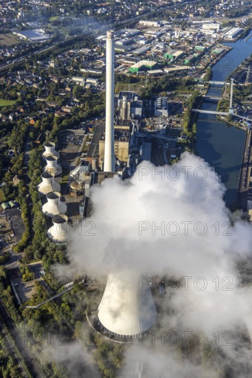Aerial view, STEAG Herne combined heat and power plant with construction project gas and steam power plant GuD Herne in the district Baukau-West in Herne, Ruhr area, North Rhine-Westphalia, Germany, construction work, construction area, construction site, building plots, construction project, construction site, DE, steam cloud, Europe, Herne, power plant, aerial view, aerial photography, aerial photography, new construction, smoke cloud, overview, bird's eye view, birds-eyes view, overview
