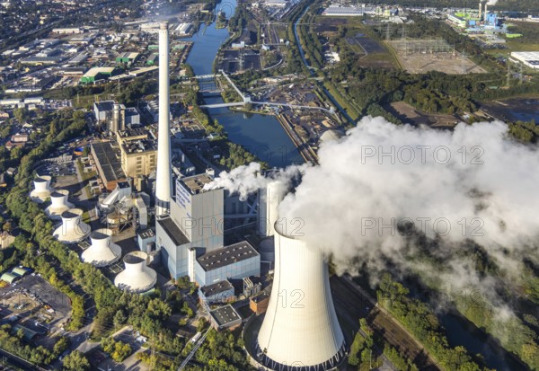 Aerial view, STEAG Herne combined heat and power plant with construction project gas and steam power plant GuD Herne in the district Baukau-West in Herne, Ruhr area, North Rhine-Westphalia, Germany, construction work, construction area, construction site, building plots, construction project, construction site, DE, steam cloud, Europe, Herne, power plant, aerial view, aerial photography, aerial photography, new construction, smoke cloud, overview, bird's eye view, birds-eyes view, overview