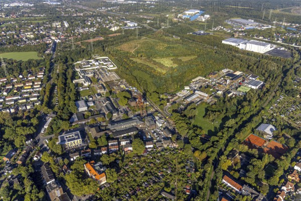Aerial view, industrial area Wilhelmstraße with winding tower of the former Pluto colliery as well as the innospec Deutschland chemical plant and the Herne prison in the Wanne district of Herne, Ruhr area, North Rhine-Westphalia, Germany, DE, Europe, imprisonment, prison, detention centre, Herne, correctional facility, aerial view, aerial photography, aerial photography, overview, custody, bird's-eye view, colliery site, birds-eyes view, overview
