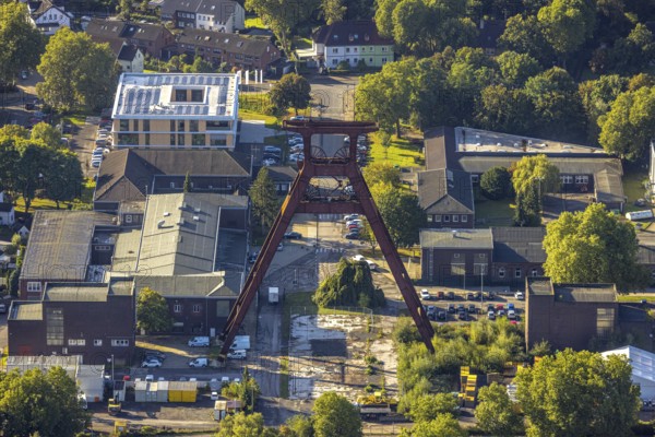 Aerial view, industrial estate Wilhelmstraße with winding tower of the former Pluto colliery in the district of Wanne in Herne, Ruhr area, North Rhine-Westphalia, Germany, DE, Europe, Herne, aerial view, aerial photography, aerial photography, overview, bird's eye view, colliery site, birds-eyes view, overview