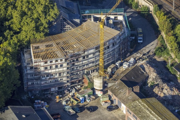 Aerial view, former Heitkamp villa, construction site and new building for flats at Heitkampsfeld in the Wanne-Süd district of Herne, Ruhr area, North Rhine-Westphalia, Germany, construction work, construction area, construction site, building plots, construction crane, construction project, construction site, DE, Europe, property tax, Heitkampsfeld, Herne, real estate, aerial view, aerial photography, aerial photography, new building, overview, bird's eye view, living and life, residential buildings, birds-eyes view, overview