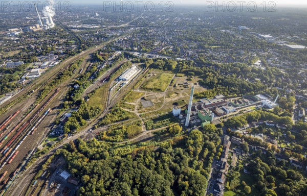Aerial view, Herne freight yard with fallow land of the former General Blumenthal mine with Stadler Rail Service and Shamrock power station in the Wanne district of Herne, Ruhr area, North Rhine-Westphalia, Germany, railway tracks, railway station, DE, Deutsche Bahn AG, Europe, distant view, railway tracks, freight yard, goods trains, main station, main station, Herne, aerial view, aerial photography, aerial photography, marshalling yard, Stadler Rail Service, signal box, overview, bird's-eye view, overview
