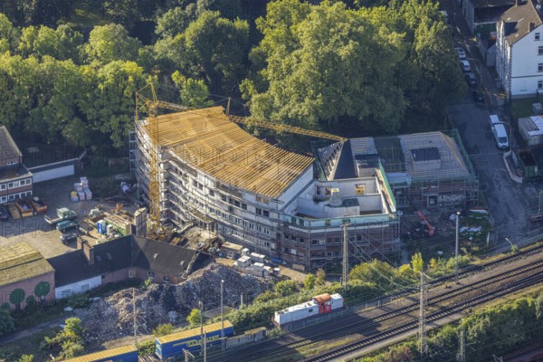 Aerial view, former Heitkamp-Villa construction site and new building for flats at Heitkampsfeld in the district Wanne-Süd in Herne, Ruhr area, North Rhine-Westphalia, Germany, construction work, construction area, construction site, building plots, construction crane, construction project, construction site, DE, Europe, property tax, Heitkampsfeld, Herne, real estate, aerial view, aerial photography, aerial photography, new building, overview, bird's eye view, living and life, residential buildings, birds-eyes view, overview