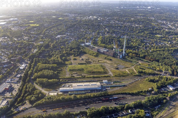 Aerial view, brownfield site of the former General Blumenthal mine with Stadler Rail Service and Shamrock power station in the Wanne district of Herne, Ruhr area, North Rhine-Westphalia, Germany, railway tracks, DE, Deutsche Bahn AG, Europe, distant view, railway tracks, freight yard, goods trains, Herne, aerial view, aerial photography, aerial photography, signal box, overview, bird's-eye view, bird's-eye view, overview