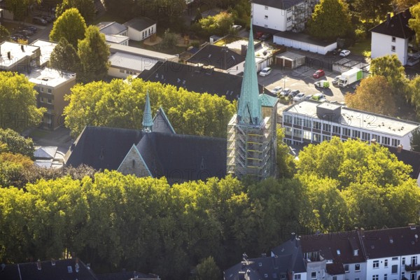 Aerial view, renovation of the church tower of the Catholic Herz-Jesu-Kirche in the Herne-Mitte district in Herne, Ruhr area, North Rhine-Westphalia, Germany, place of worship, construction work, construction area, construction site, scaffolding, building site, construction project, construction site, DE, Europe, religious community, place of worship, holy site, Herne, church, parish, denomination, aerial view, aerial photography, aerial photography, parish church, religion, religious site, renovation, refurbishment, overview, bird's-eye view, overview