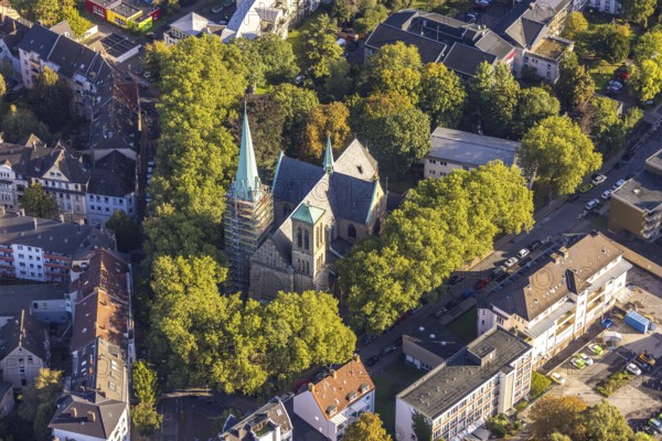 Aerial view, renovation of the church tower of the Catholic Herz-Jesu-Kirche in the Herne-Mitte district in Herne, Ruhr area, North Rhine-Westphalia, Germany, place of worship, construction work, construction area, construction site, scaffolding, building site, construction project, construction site, DE, Europe, religious community, place of worship, holy site, Herne, church, parish, denomination, aerial view, aerial photography, aerial photography, parish church, religion, religious site, renovation, refurbishment, overview, bird's-eye view, overview