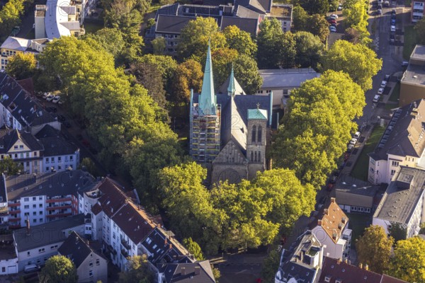 Aerial view, renovation of the church tower of the Catholic Herz-Jesu-Kirche in the Herne-Mitte district in Herne, Ruhr area, North Rhine-Westphalia, Germany, place of worship, construction work, construction area, construction site, scaffolding, building site, construction project, construction site, DE, Europe, religious community, place of worship, holy site, Herne, church, parish, denomination, aerial view, aerial photography, aerial photography, parish church, religion, religious site, renovation, refurbishment, overview, bird's-eye view, overview