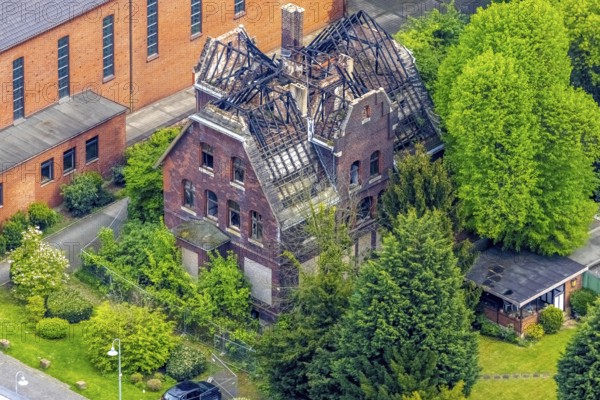Aerial view, St. Marien Eickel Church at St. Marien Hospital, building fire at the outbuilding, Eickel, Herne, Ruhr area, North Rhine-Westphalia, Germany, demolition, place of worship, fire, DE, Europe, religious community, place of worship, holy place, church, parish, denomination, aerial view, aerial photography, aerial photography, religion, religious site, overview, decay, bird's-eye view, overview, destroyed building