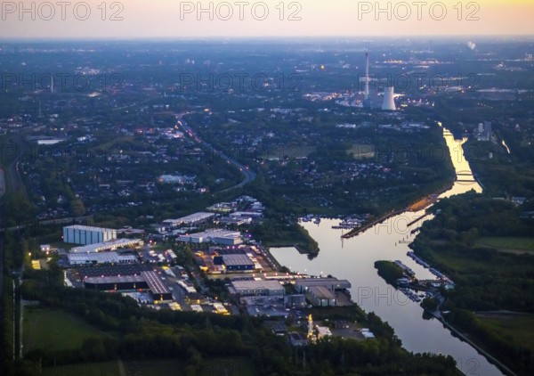 Aerial view, Herner Meer, Rhine-Herne Canal, Friedrich der Große industrial estate, Herne-East lock, STEAG Herne thermal power station, Pöppinghausen, Castrop-Rauxel, Ruhr area, North Rhine-Westphalia, Germany, sunset, DE, twilight photography, Europe, commercial enterprises, commercial area, industrial estate, industrial park, commercial location, commercial use, IGZ Herne, industrial area, industrial building, industrial location, power plant, light pollution, aerial photography, aerial photography, aerial photography, night, night photography, night flight, airlock, overview, bird's eye view, illuminated streets, birds-eyes view, nightflight, overview