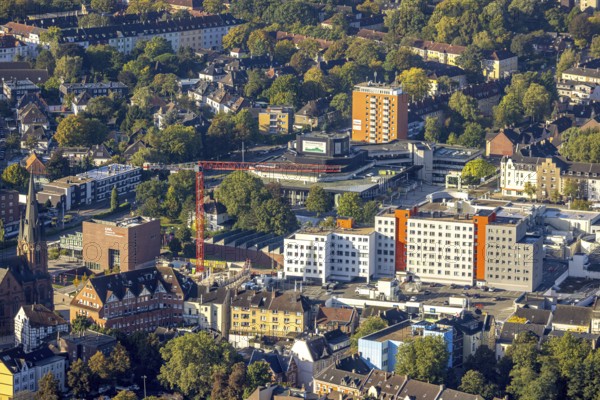 Aerial view, construction site and new building Europaplatz with Europagarten and City Center with apartment block, in the background and the cultural centre in the district Herne-Mitte in Herne, Ruhr area, North Rhine-Westphalia, Germany, construction work, construction area, building site, building plots, construction project, construction site, DE, Europe, Herne, culture, art, aerial view, aerial photography, aerial photography, new building, overview, venue, event location, bird's eye view, birds-eyes view, cultural use, overview