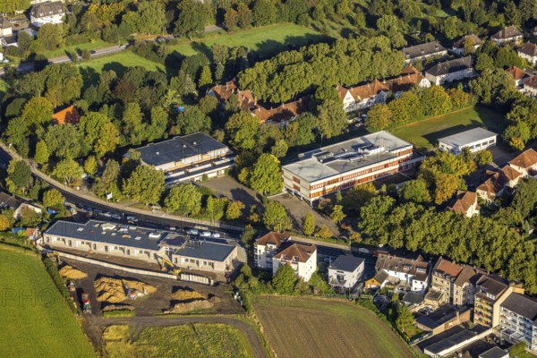 Aerial view, Sodingen secondary school and construction site with new building of a day care centre Am vineyard at Castroper Straße in the district Börnig in Herne, Ruhr area, North Rhine-Westphalia, Germany, construction work, construction area, construction site, building plots, construction project, construction site, DE, Europe, Herne, kindergarten, day care centre, day care facility, day care centre, aerial view, aerial photography, aerial photography, new building, overview, bird's eye view, overview