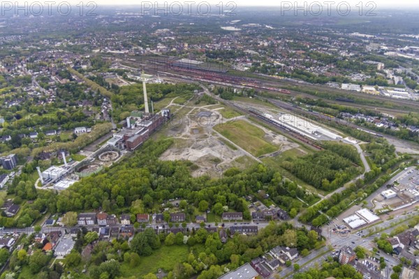 Aerial view, construction site of new Stadler Rail Vehicles branch, former General Blumenthal mine site, former Uniper Shamrock power plant, Wanne-Süd, Herne, Ruhr area, North Rhine-Westphalia, Germany, railway tracks, railway station, DE, Deutsche Bahn AG, Europe, commercial enterprises, commercial area, commercial area, commercial location, commercial use, main station, industrial facilities, industrial area, industrial location, Kastanienallee, aerial view, aerial photography, aerial photography, Rhine-Ruhr metropolitan region, signal box, overview, bird's-eye view, Wanne-Eickel main station, birds-eyes view, overview