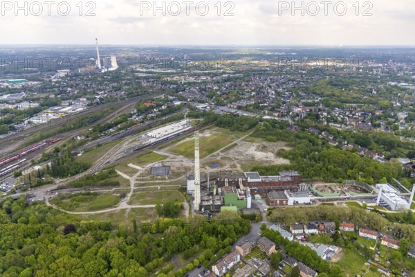 Aerial view, construction site of new Stadler Rail Vehicles branch, former General Blumenthal mine site, former Uniper Shamrock power plant, Wanne-Süd, Herne, Ruhr area, North Rhine-Westphalia, Germany, railway tracks, railway station, DE, Deutsche Bahn AG, Europe, commercial enterprises, commercial area, commercial area, commercial location, commercial use, main station, industrial facilities, industrial area, industrial location, Kastanienallee, aerial view, aerial photography, aerial photography, Rhine-Ruhr metropolitan region, signal box, overview, bird's-eye view, Wanne-Eickel main station, birds-eyes view, overview