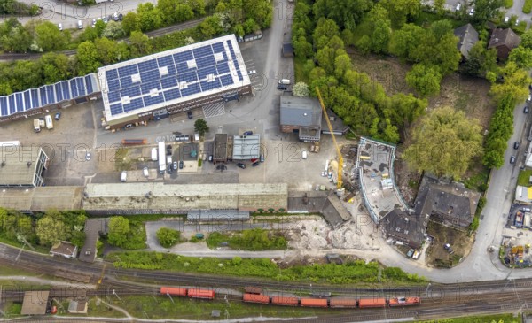 Aerial photo, former Heitkamp villa, construction site and new building for flats on Langkampstraße, TROPOS MOTORS EUROPE GmbH with solar panel, Wanne-Süd, Herne, Ruhr area, North Rhine-Westphalia, Germany, construction work, construction area, construction site, building plots, construction crane, construction project, construction project, construction site, DE, Europe, property tax, real estate, aerial view, aerial photography, aerial photography, new construction, photovoltaic, photovoltaic system, solar, solar system, solar energy, solar energy, overview, bird's eye view, living and life, residential buildings, birds-eyes view, overview