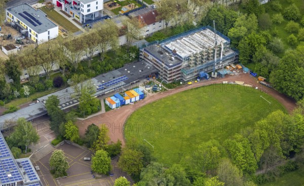 Aerial view, Otto-cock-Gymnasium with construction site indoor swimming pool, Sodingen, Herne, Ruhr area, North Rhine-Westphalia, Germany, construction work, construction, construction area, building site, building plots, construction measure, construction project, construction site, education, educational institution, DE, Europe, grammar school, indoor swimming pool, educational institute, aerial view, aerial photography, aerial photography, Rhine-Ruhr metropolitan region, photovoltaic, photovoltaic system, school, solar, solar system, solar energy, solar energy, overview, bird's-eye view, birds-eyes view, overview
