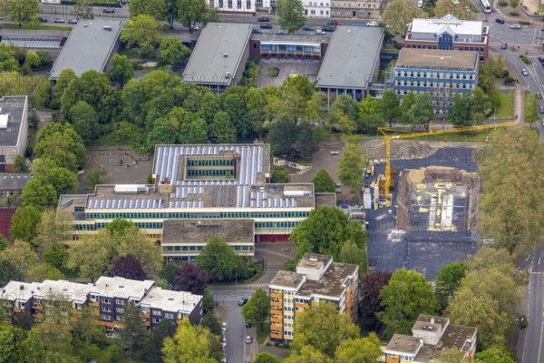 Aerial photo, construction site at Pestalozzi-Gymnasium, Baukau, Herne, Ruhr area, North Rhine-Westphalia, Germany, construction work, construction area, construction site, building plots, construction crane, construction measure, construction project, construction site, education, educational institution, Cranger Straße, DE, Europe, grammar school, teaching institute, aerial photo, aerial photography, aerial photography, school, overview, bird's-eye view, bird's-eye view, overview
