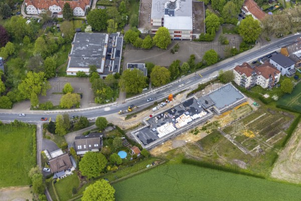 Aerial view, construction site at Castroper Straße at the housing estate Gartenstadt Teutoburgia, Börnig, Herne, Ruhr area, North Rhine-Westphalia, Germany, workers' housing estate, Baarestraße, construction work, construction, construction area, building site, building plots, construction project, construction site, DE, monument protection, Europe, property tax, green areas, green trees, gardens, Real estate, aerial view, aerial photography, aerial photography, apartment blocks, Rhine-Ruhr metropolitan region, new build, landmark, overview, bird's eye view, housing estate, housing and living, residential area, residential buildings, quality of living, residential neighbourhood, housing estate, Teutoburgia housing estate, colliery housing estate, bird's eye view, overview, red roofs