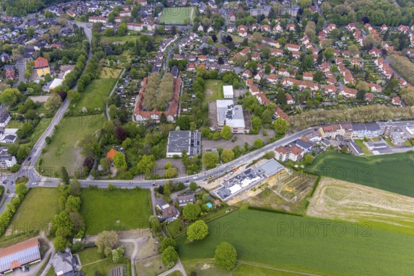 Aerial view, housing estate Gartenstadt Teutoburgia, colliery housing estate, Teutoburgiahof, Sodingen secondary school, construction site on Castroper Straße, Börnig, Herne, Ruhr area, North Rhine-Westphalia, Germany, workers' housing estate, Baarestraße, construction work, building, construction area, building site, building plots, construction measure, construction project, construction site, education, educational institution, DE, monument protection, Europe, property tax, green areas, green trees, gardens, real estate, educational institute, aerial view, aerial photography, aerial photography, multi-family houses, metropolitan region Rhine-Ruhr, new building, secondary school, school, sight, overview, bird's eye view, residential complex, living and life, residential area, residential houses, residential quality, residential neighbourhood, housing estate, housing estate Teutoburgia, birds-eyes view, overview, red roofs