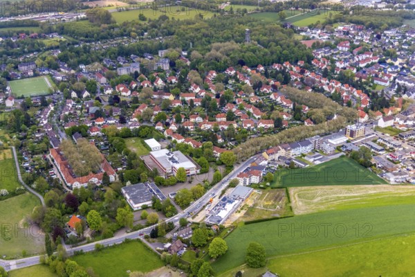 Aerial view, housing estate Gartenstadt Teutoburgia, colliery housing estate, Teutoburgiahof, Sodingen secondary school, construction site on Castroper Straße, Börnig, Herne, Ruhr area, North Rhine-Westphalia, Germany, workers' housing estate, Baarestraße, construction work, building, construction area, building site, building plots, construction measure, construction project, construction site, education, educational institution, DE, monument protection, Europe, property tax, green areas, green trees, gardens, real estate, educational institute, aerial view, aerial photography, aerial photography, multi-family houses, metropolitan region Rhine-Ruhr, new building, secondary school, school, sight, overview, bird's eye view, residential complex, living and life, residential area, residential houses, residential quality, residential neighbourhood, housing estate, housing estate Teutoburgia, birds-eyes view, overview, red roofs