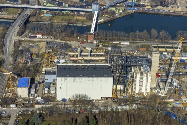 Aerial photo, STEAG combined heat and power plant Herne on the Rhine-Herne Canal, construction site new gas and steam power plant, Baukau-West, Herne, Ruhr area, North Rhine-Westphalia, Germany, construction work, construction, construction area, construction site, construction project, construction site, DE, steam cloud, power plant, Europe, district heating, combined cycle power plant, Hertener Straße, power plant, aerial view, aerial photography, aerial photography, Rhine-Ruhr metropolitan region, new construction, smoke cloud, coal-fired power plant, overview, bird's-eye view, overview
