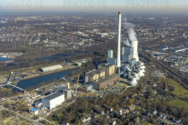 Aerial photo, STEAG combined heat and power plant Herne on the Rhine-Herne Canal, construction site new gas and steam power plant, Baukau-West, Herne, Ruhr area, North Rhine-Westphalia, Germany, construction work, construction, construction area, construction site, construction project, construction site, DE, steam cloud, power plant, Europe, district heating, combined cycle power plant, Hertener Straße, power plant, aerial view, aerial photography, aerial photography, Rhine-Ruhr metropolitan region, new construction, smoke cloud, coal-fired power plant, overview, bird's-eye view, overview