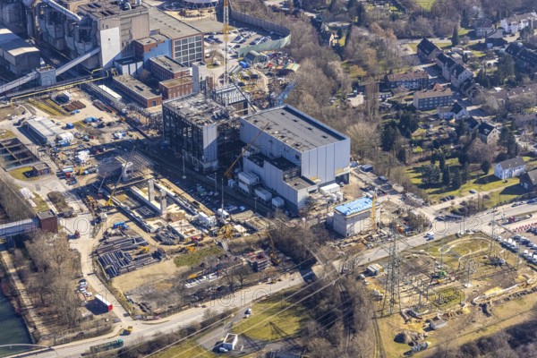 Aerial photo, STEAG combined heat and power plant Herne on the Rhine-Herne Canal, construction site new gas and steam power plant, Baukau-West, Herne, Ruhr area, North Rhine-Westphalia, Germany, construction work, construction, construction area, construction site, construction project, construction site, DE, steam cloud, power plant, Europe, district heating, combined cycle power plant, Hertener Straße, power plant, aerial view, aerial photography, aerial photography, Rhine-Ruhr metropolitan region, new construction, smoke cloud, coal-fired power plant, overview, bird's-eye view, overview